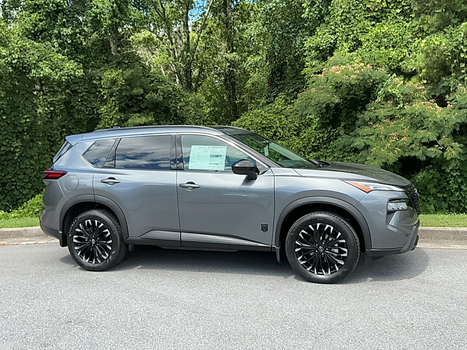 New 2026 Gun Metallic Nissan Dark Armor image 1