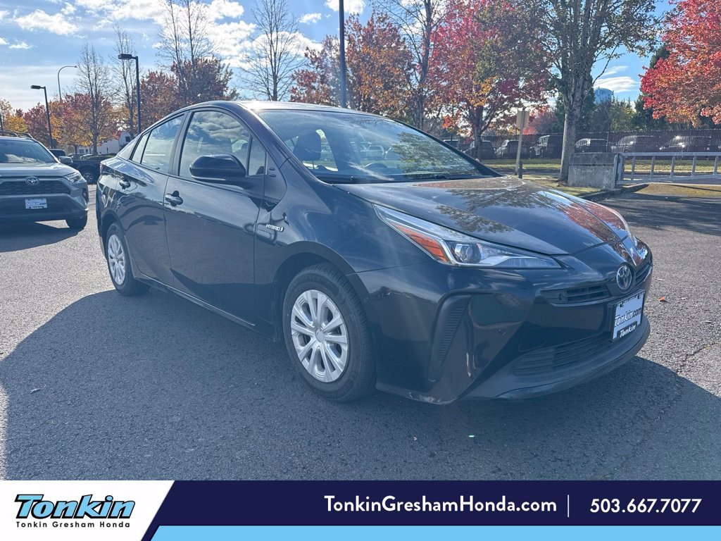 Used 2022 Midnight Black Metallic Toyota LE image 1