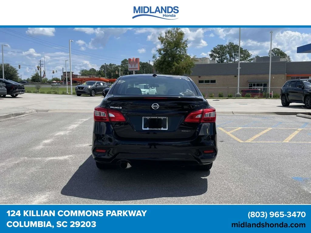 Used 2018 Super Black Nissan SR image 5