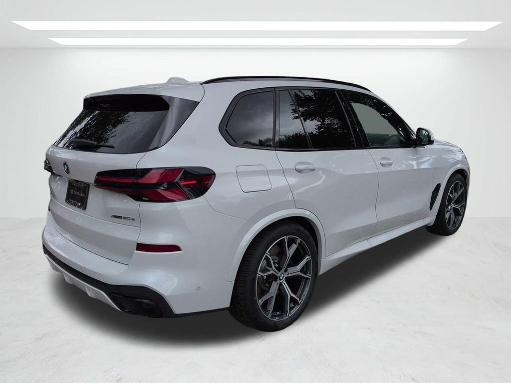 New 2026 Mineral White Metallic BMW xDrive50e image 4