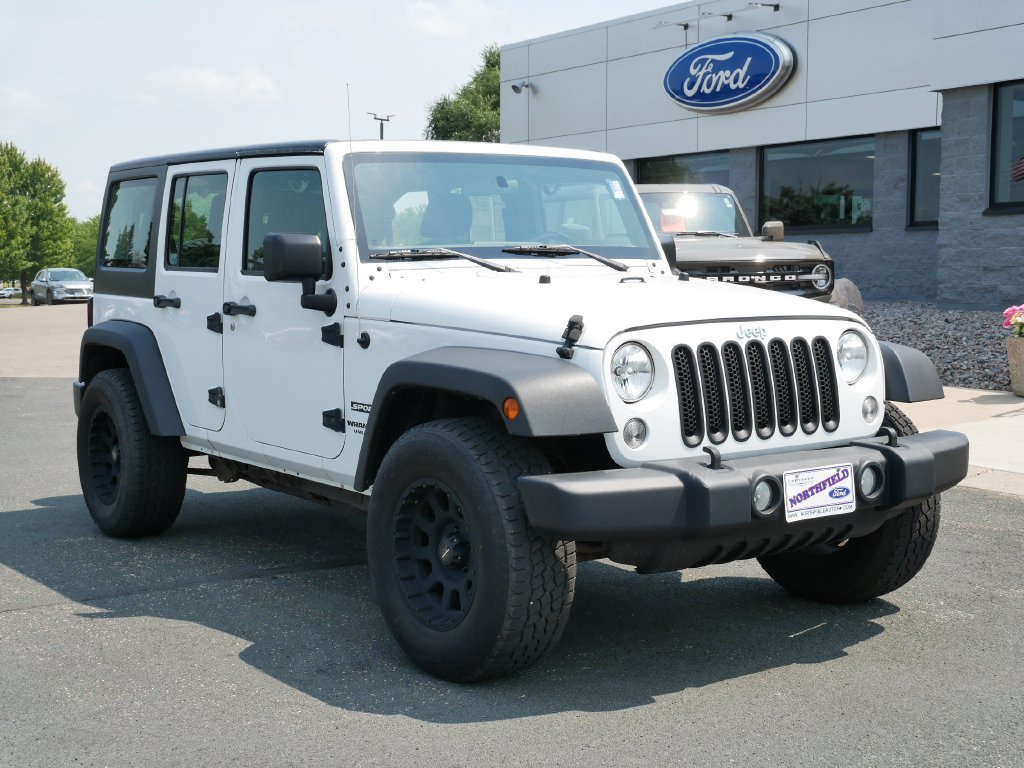 Used 2017 Jeep Wrangler Unlimited Sport with VIN 1C4BJWDG7HL521999 for sale in Northfield, Minnesota
