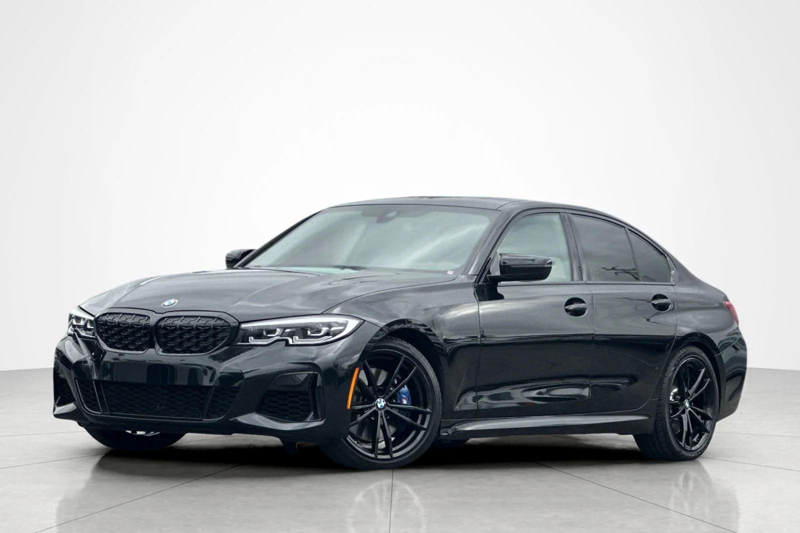 Used 2021 Black Sapphire Metallic BMW M340i image 1