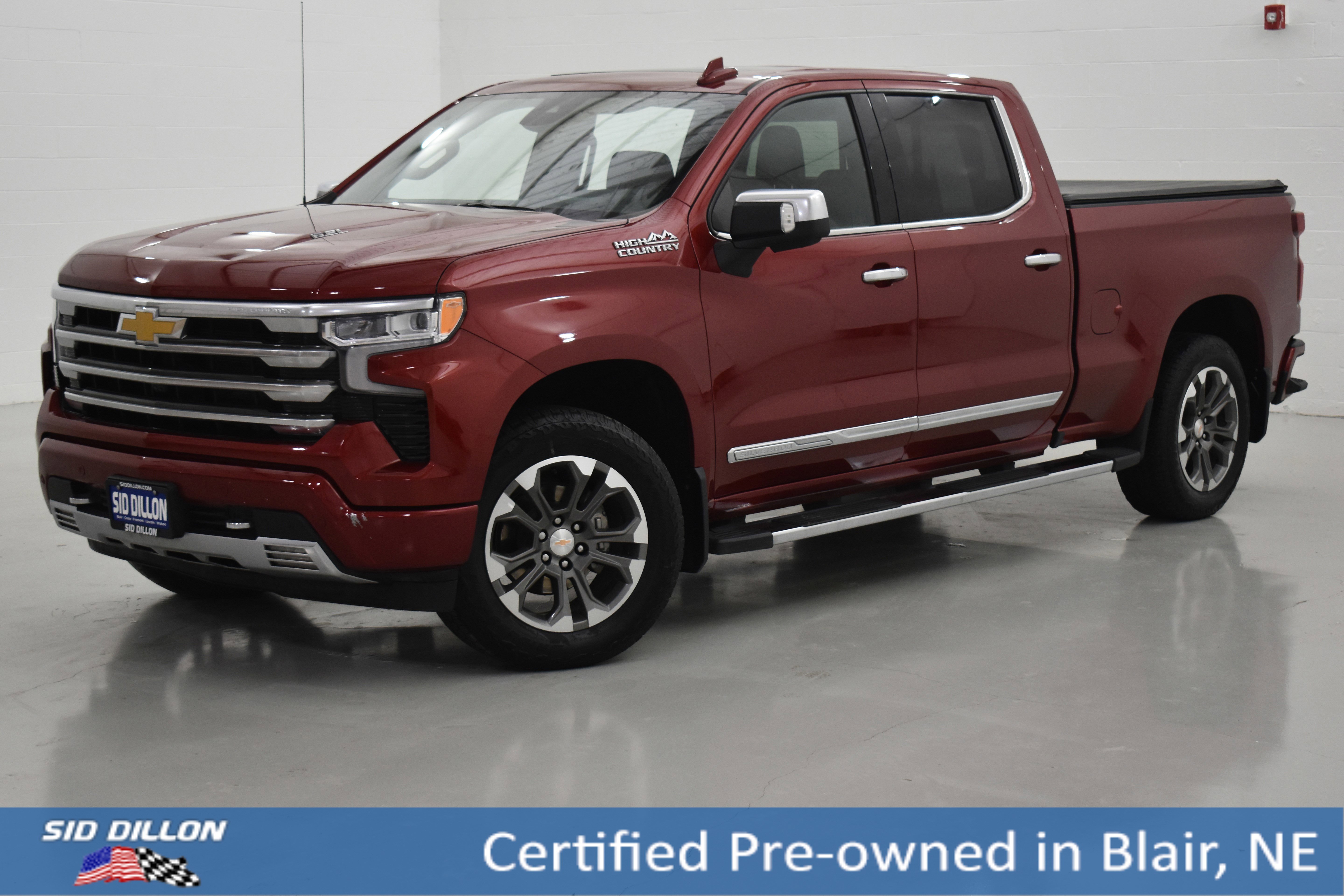 Used 2025 Radiant Red Tintcoat Chevrolet High Country image 1