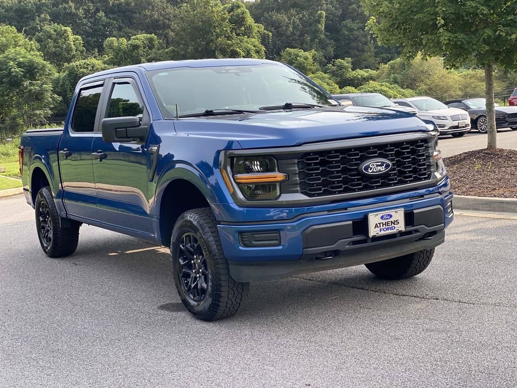 Used 2025 Atlas Blue Metallic Ford STX image 1