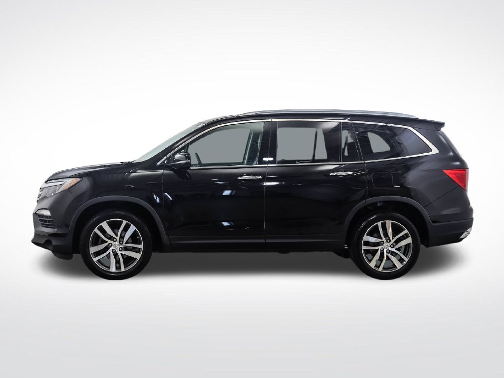 Used 2018 Honda Pilot Touring with VIN 5FNYF6H94JB004093 for sale in Minneapolis, Minnesota
