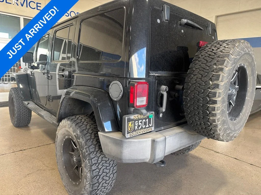 Used 2015 Black Clearcoat Jeep Unlimited Sahara image 4