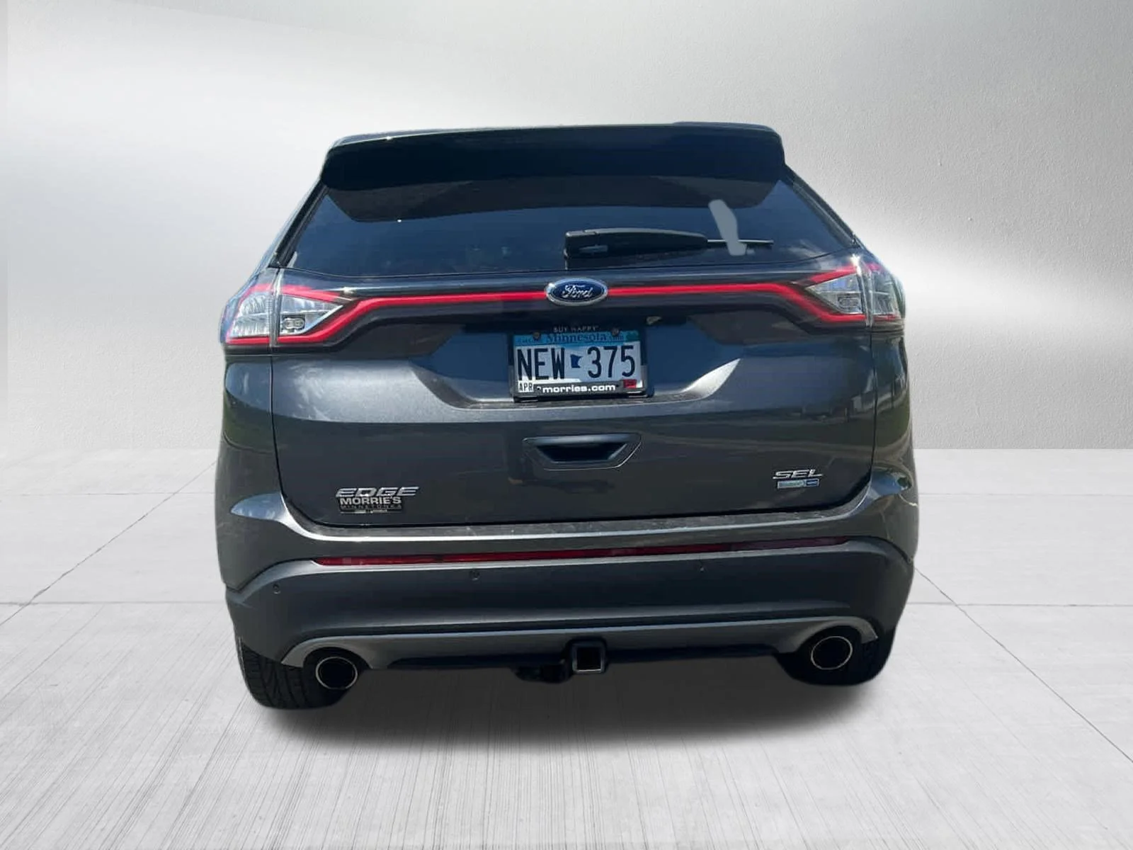 Used 2015 Magnetic Metallic Ford SEL image 6