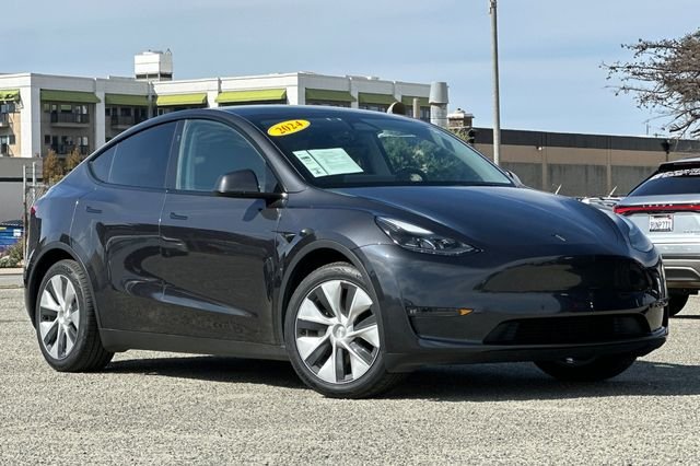 Used 2024 Tesla Model Y Long Range with VIN 7SAYGAEEXRF002476 for sale in Sand City, CA