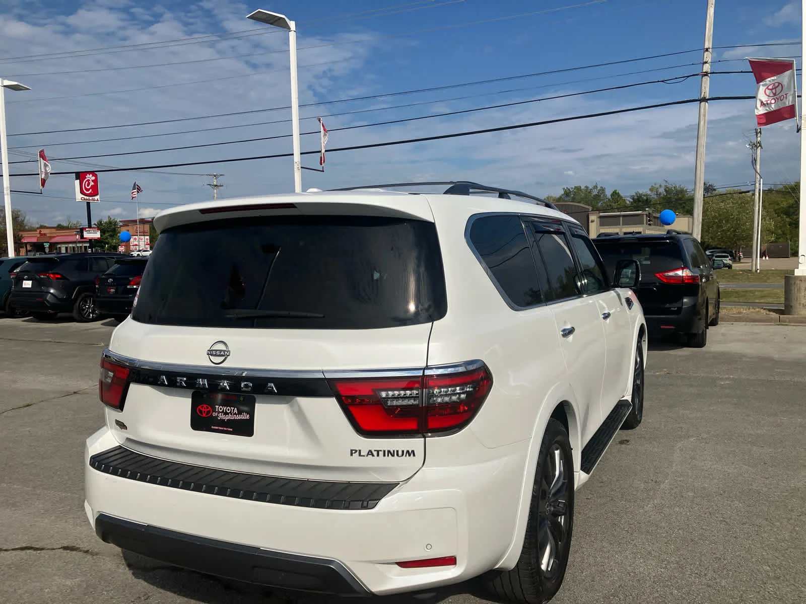 Used 2024 Aspen White Tricoat Nissan Platinum image 7