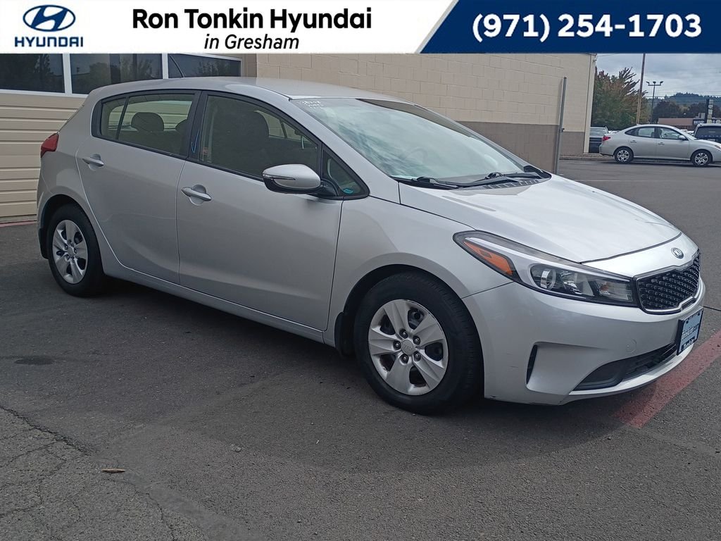 Used 2017 Silky Silver Kia LX image 1