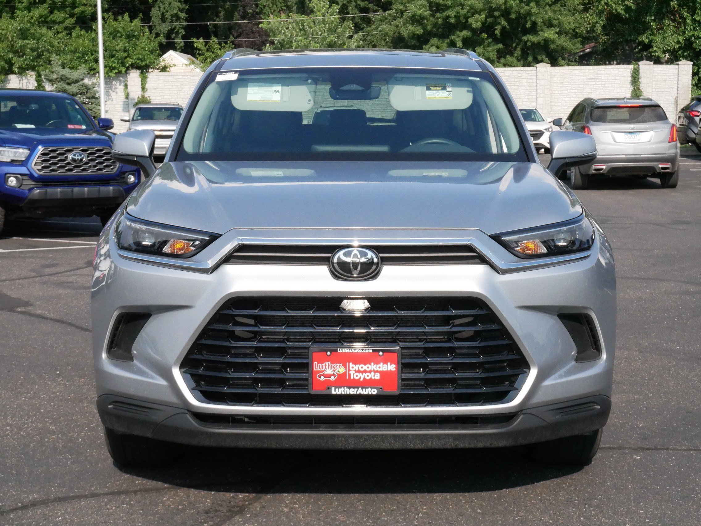 Used 2025 Toyota Grand Highlander XLE with VIN 5TDAAAB55SS089547 for sale in Brooklyn Center, Minnesota