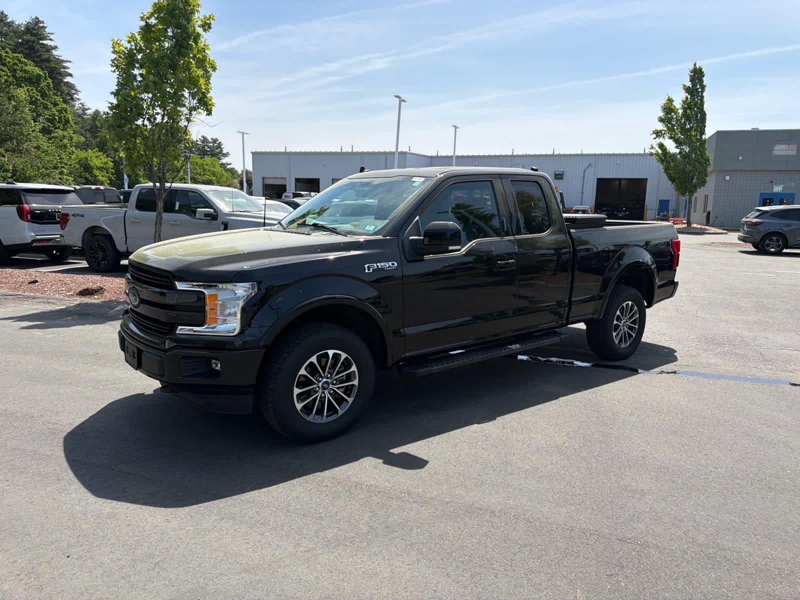 Used 2020 Agate Black Metallic Ford LARIAT image 1