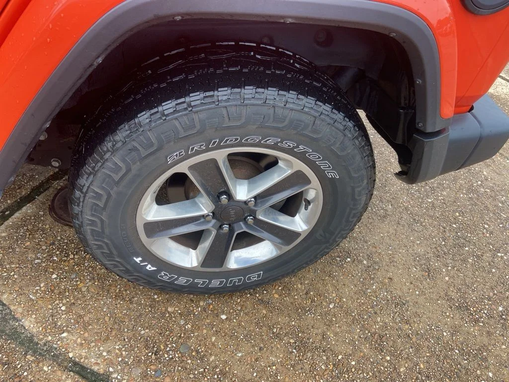 Used 2019 Orange Jeep Unlimited Sahara image 25