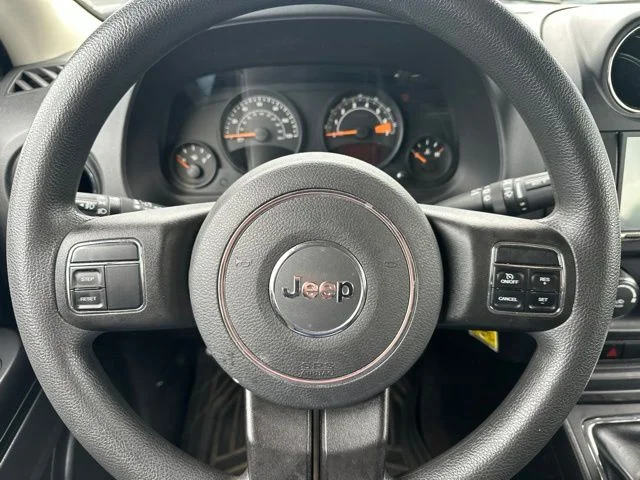 Used 2015 Granite Crystal Clearcoat Metallic Jeep Sport image 16