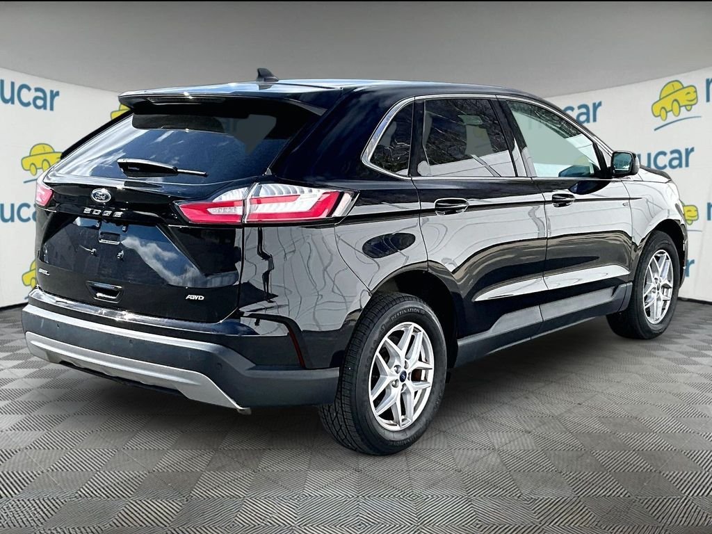 Used 2022 Black Metallic Ford SEL image 6