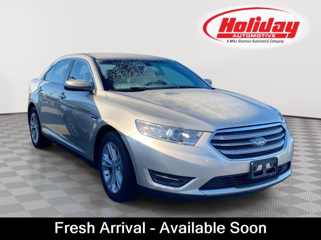 Used 2017 White Gold Metallic Ford SEL image 1