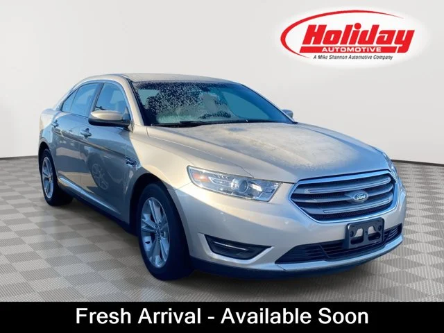 Used 2017 White Gold Metallic Ford SEL image 1