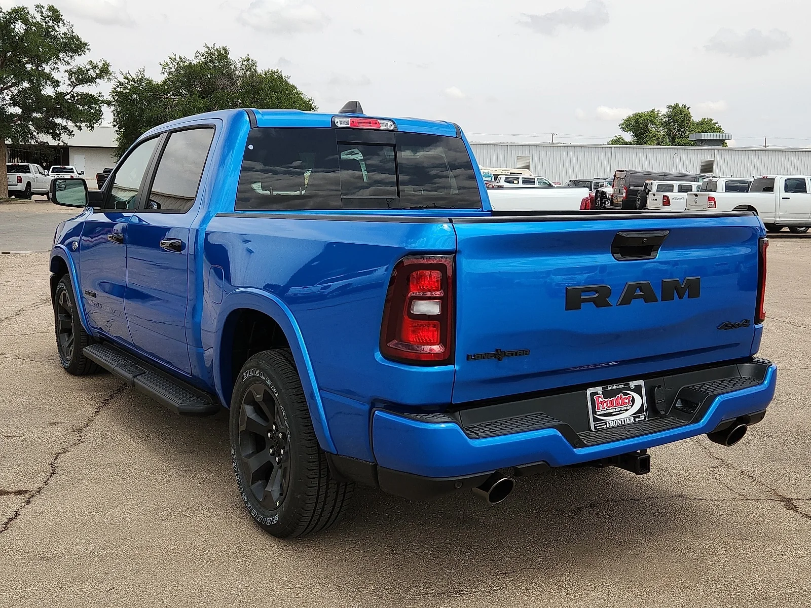 New 2026 Hydro Blue Pearl-Coat  Paint Ram LONE STAR CREW CAB 4X4 5
