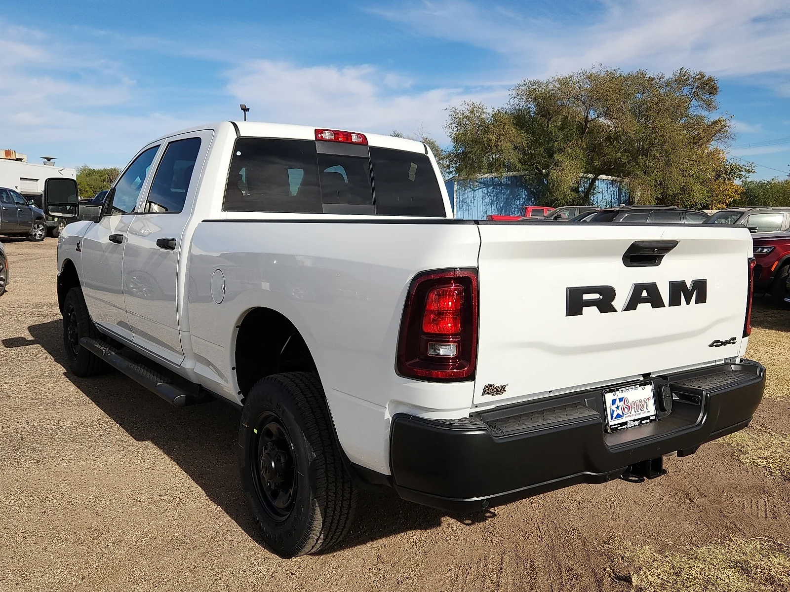 New 2026 PW7 Bright Whit Ram TRADESMAN CREW CAB 4X4 6