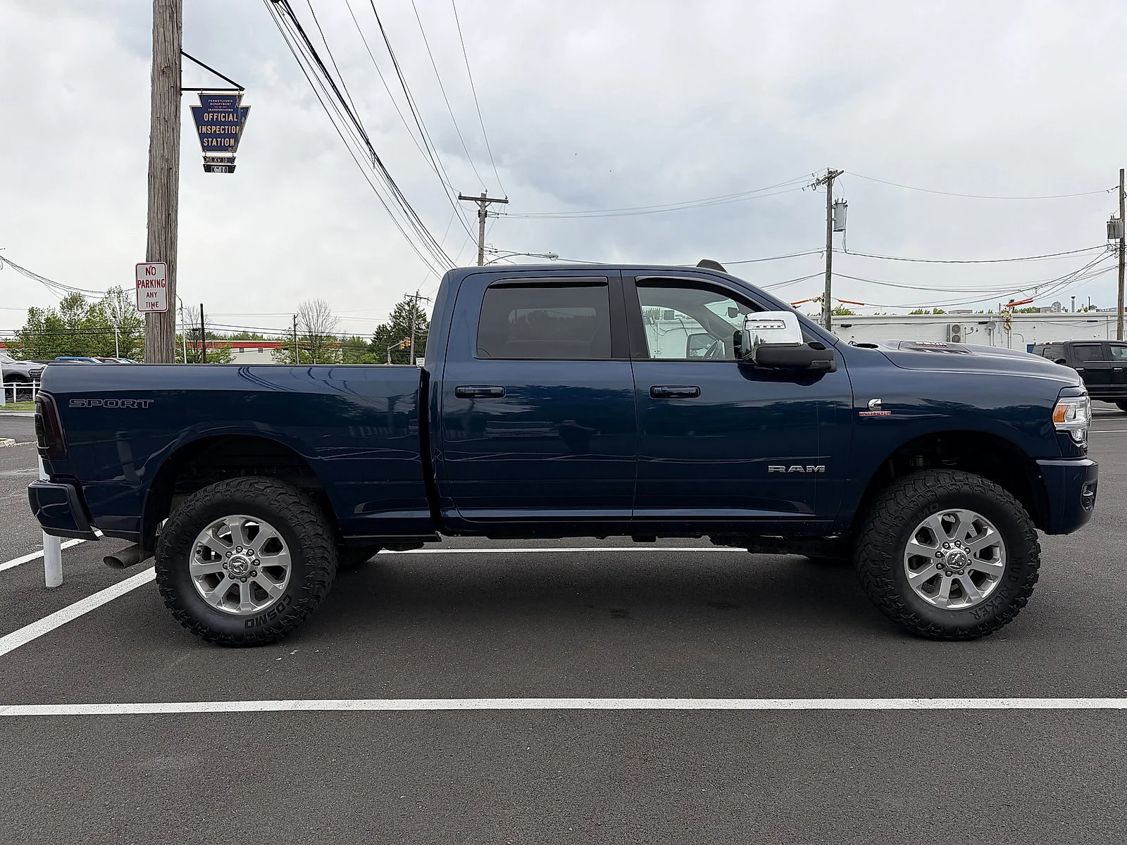 Used 2024 Patriot Blue Pearlcoat Ram Laramie image 2