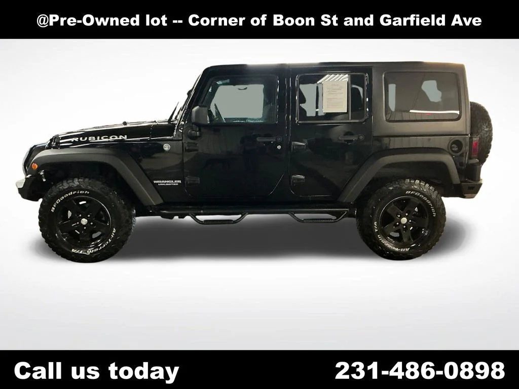 Used 2011 Black Jeep Unlimited Rubicon image 2