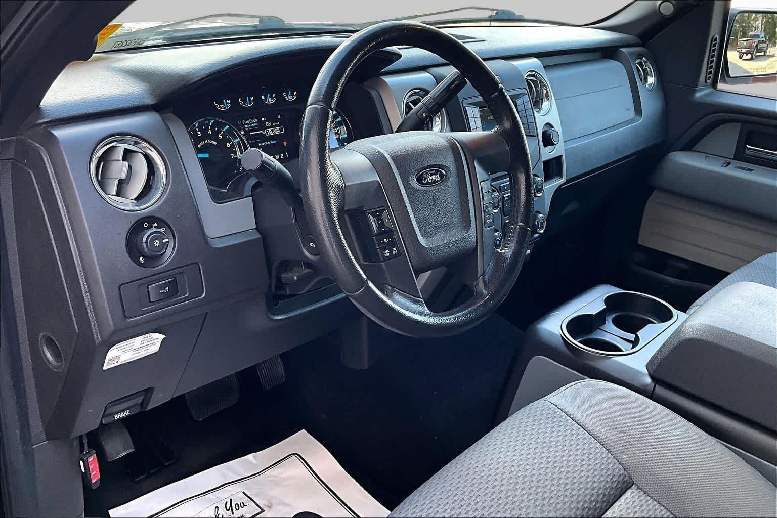 Used 2014 Tuxedo Black Metallic Ford XLT image 16