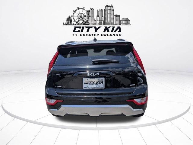 Used 2025 Black Kia EX Touring image 4