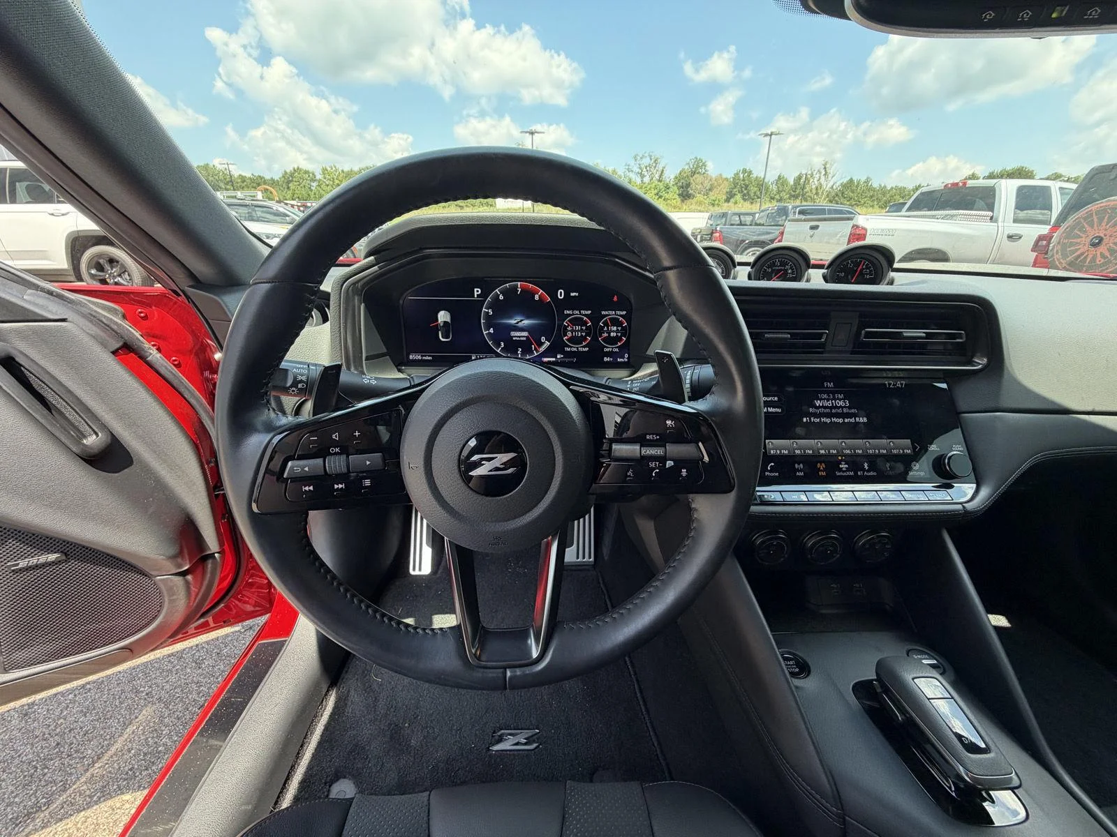 Used 2025 Solid Red/Super Black Nissan Performance image 8