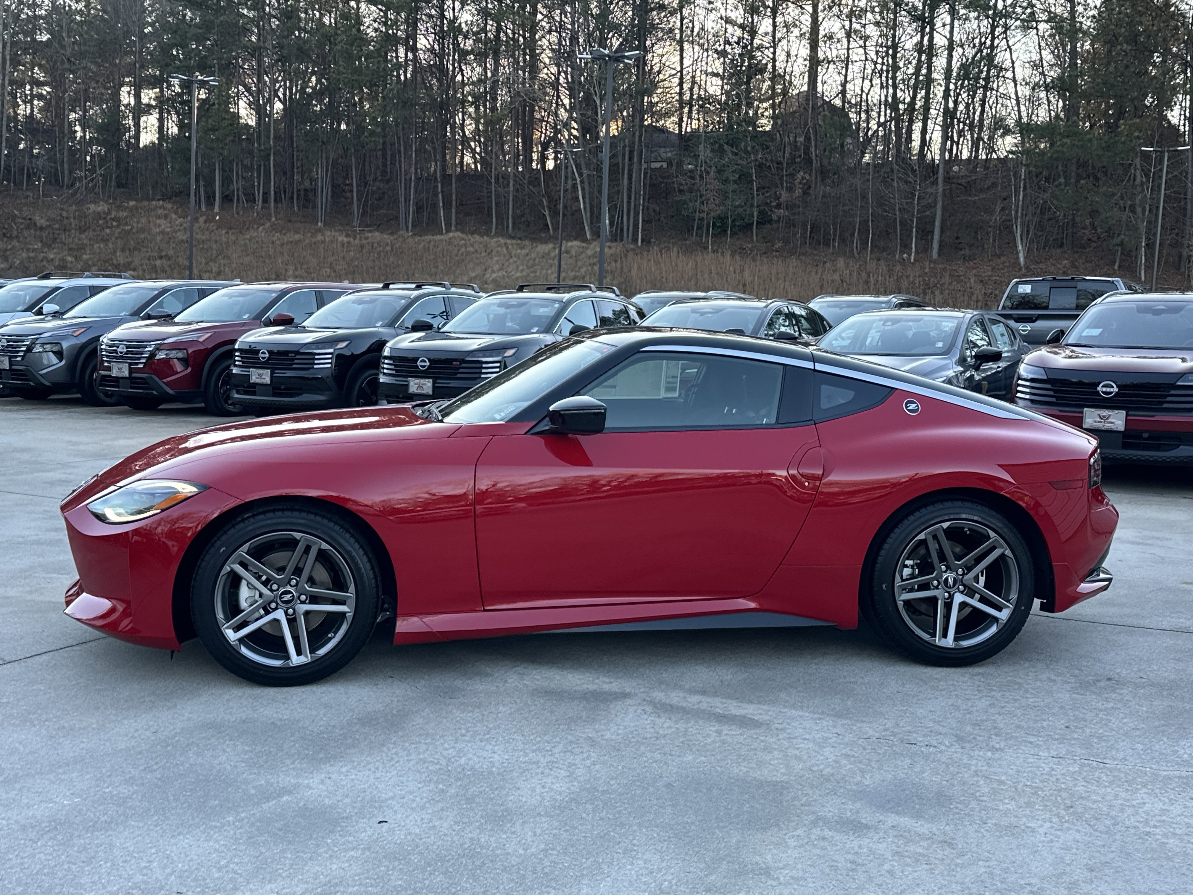 New 2026 Solid Red/Super Black Nissan Sport image 5