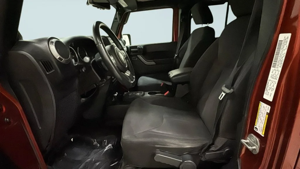 Used 2014 Orange Jeep Unlimited Sport image 6