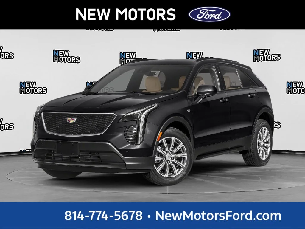 Used 2019 Black Metallic Cadillac Sport image 1