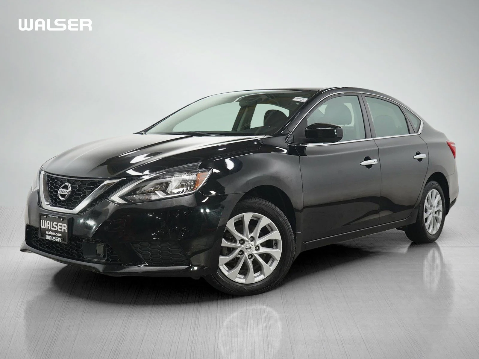 Used 2019 Super Black Nissan SV image 1