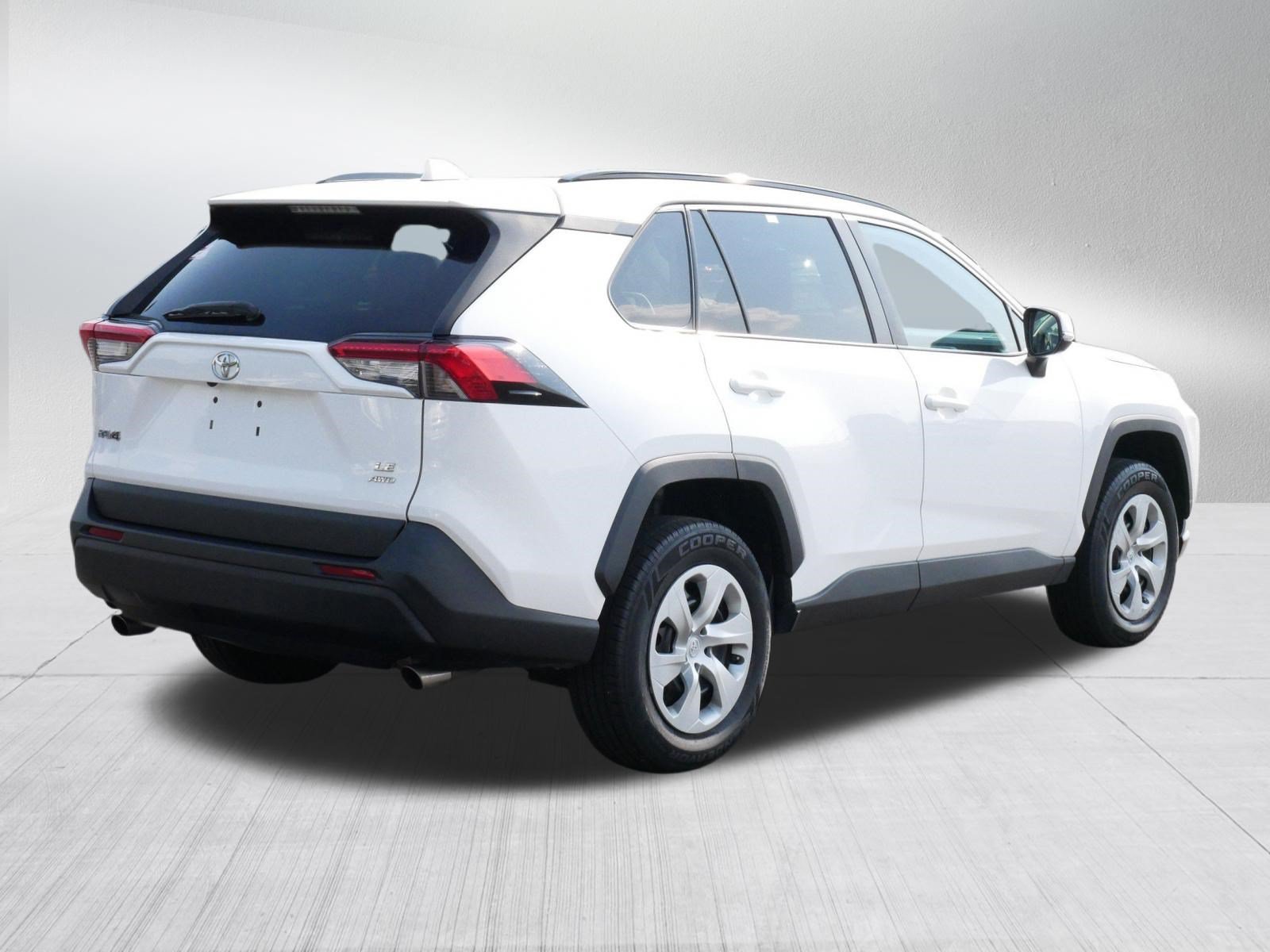 Used 2021 Super White Toyota LE image 7