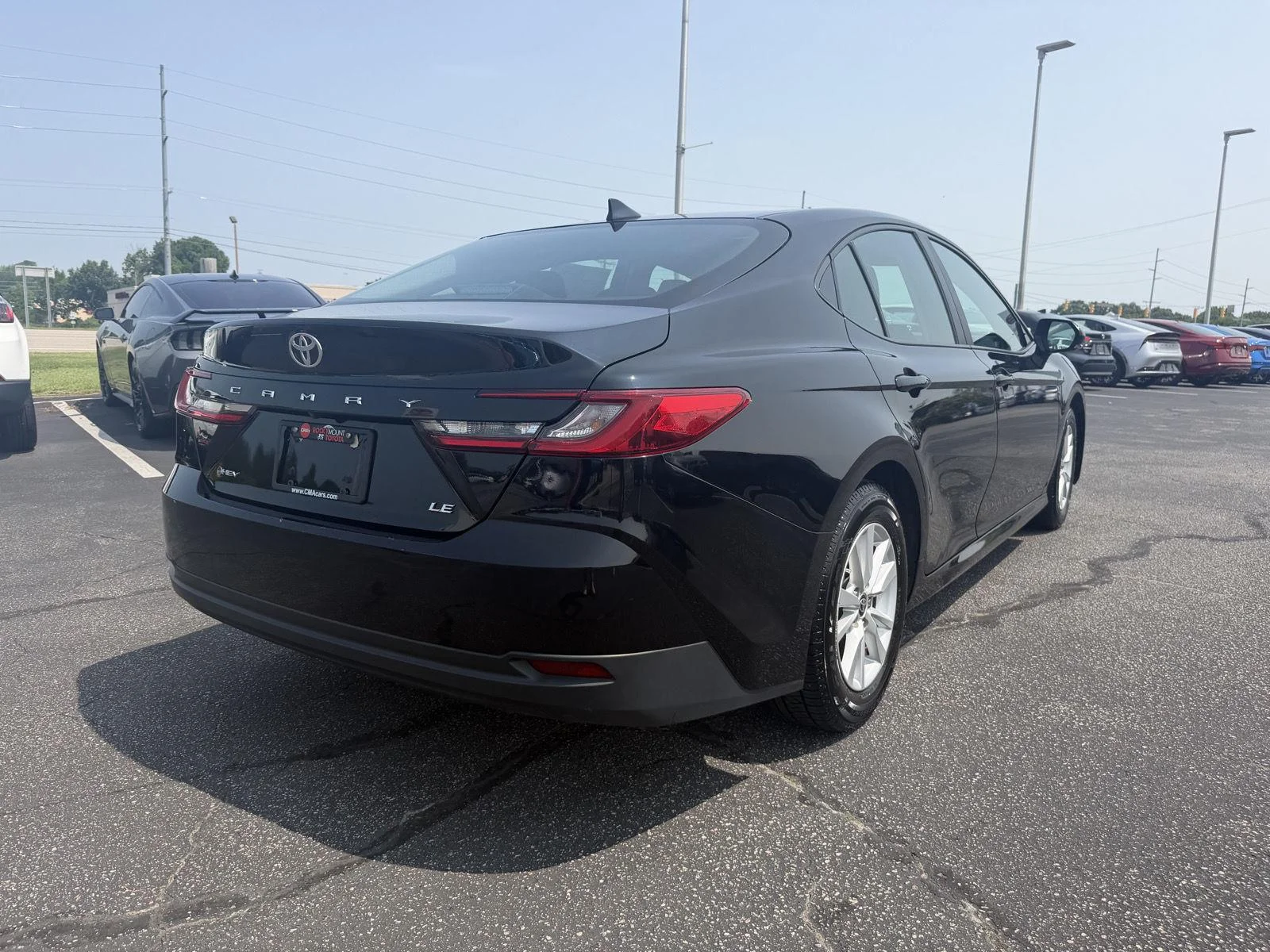 Used 2025 Midnight Black Metallic Toyota LE image 7
