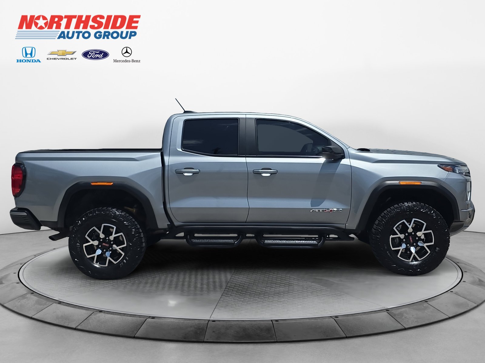 Used 2024 Sterling Metallic GMC 4WD AT4X image 8