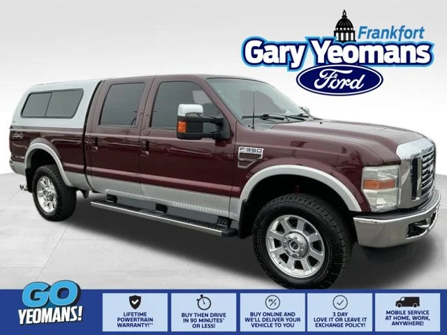 Used 2010 Royal Red Metallic Ford Lariat image 1