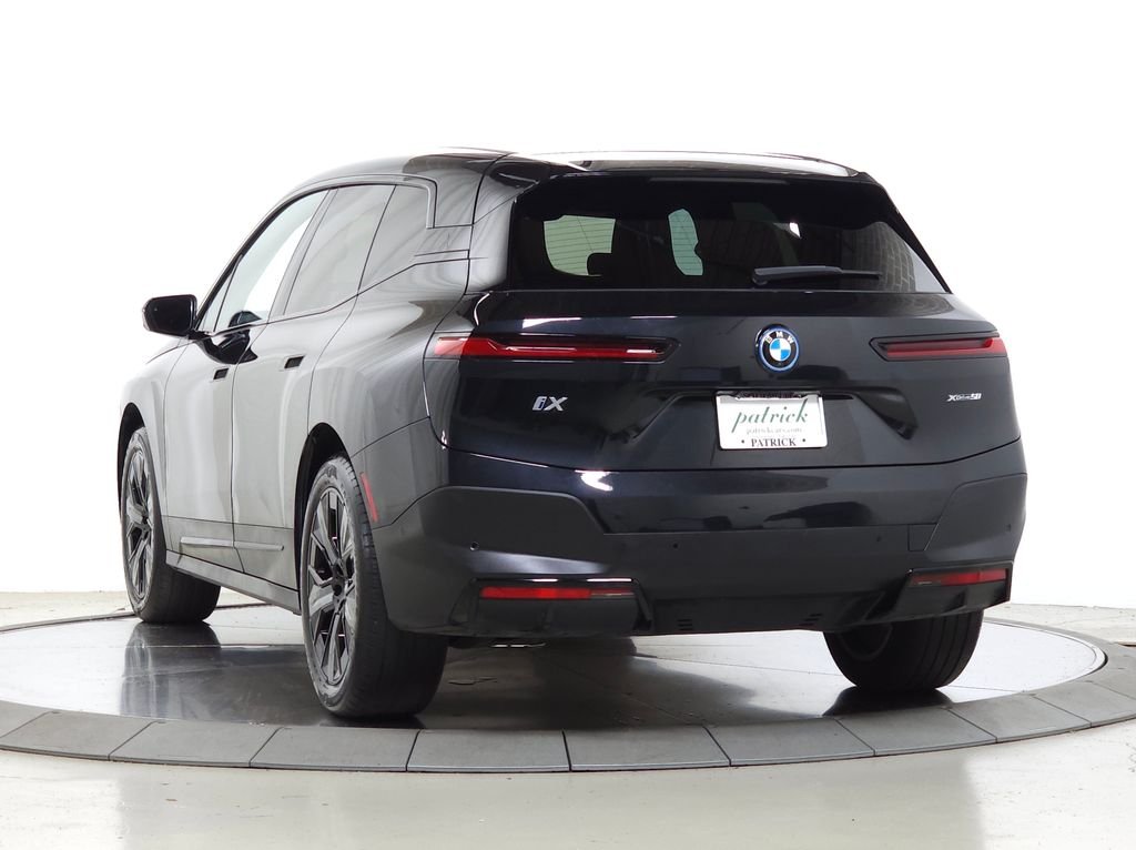 Used 2024 Black Sapphire Metallic BMW xDrive50 image 6