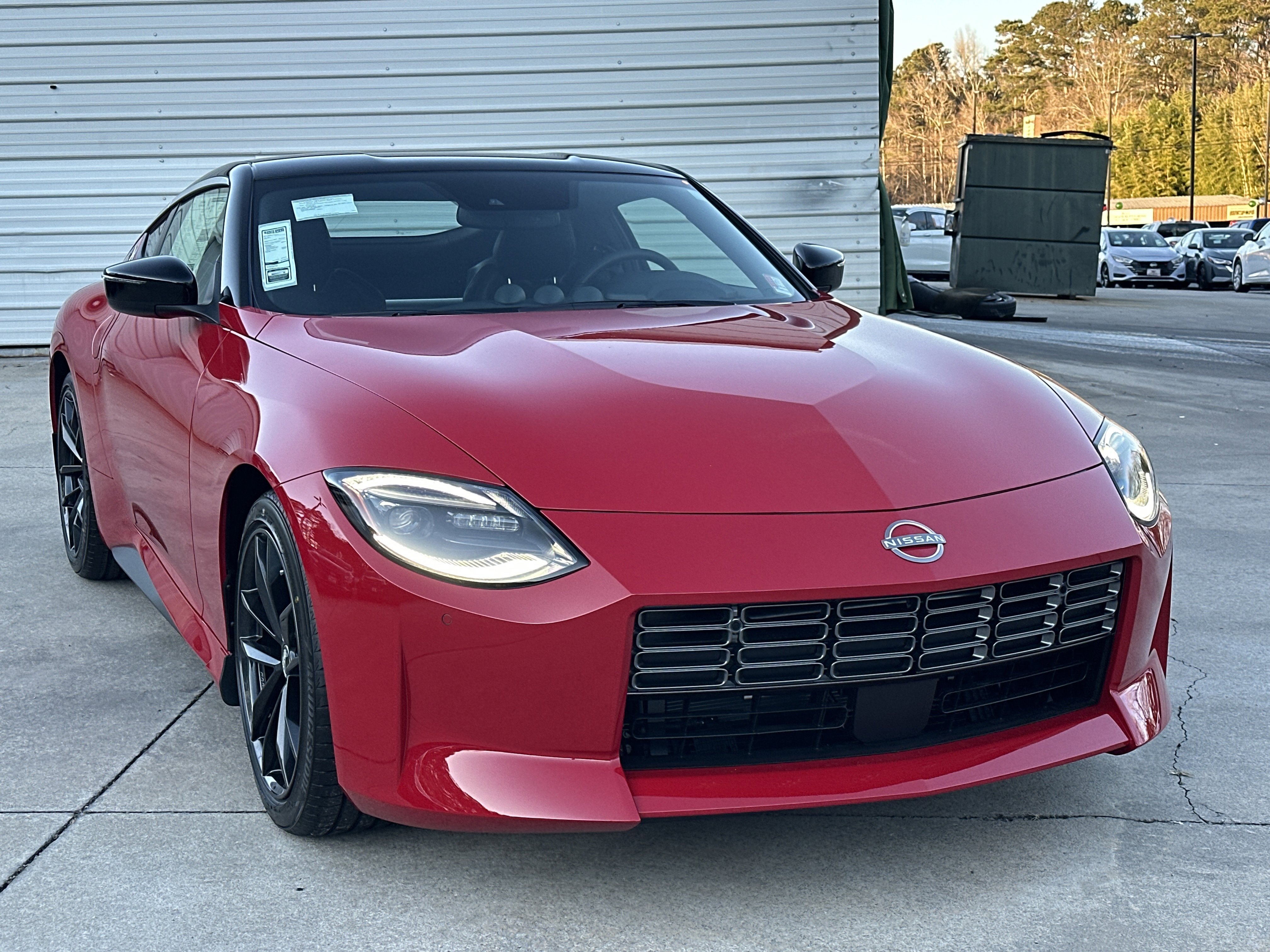 New 2026 Solid Red/Super Black Nissan Performance image 2