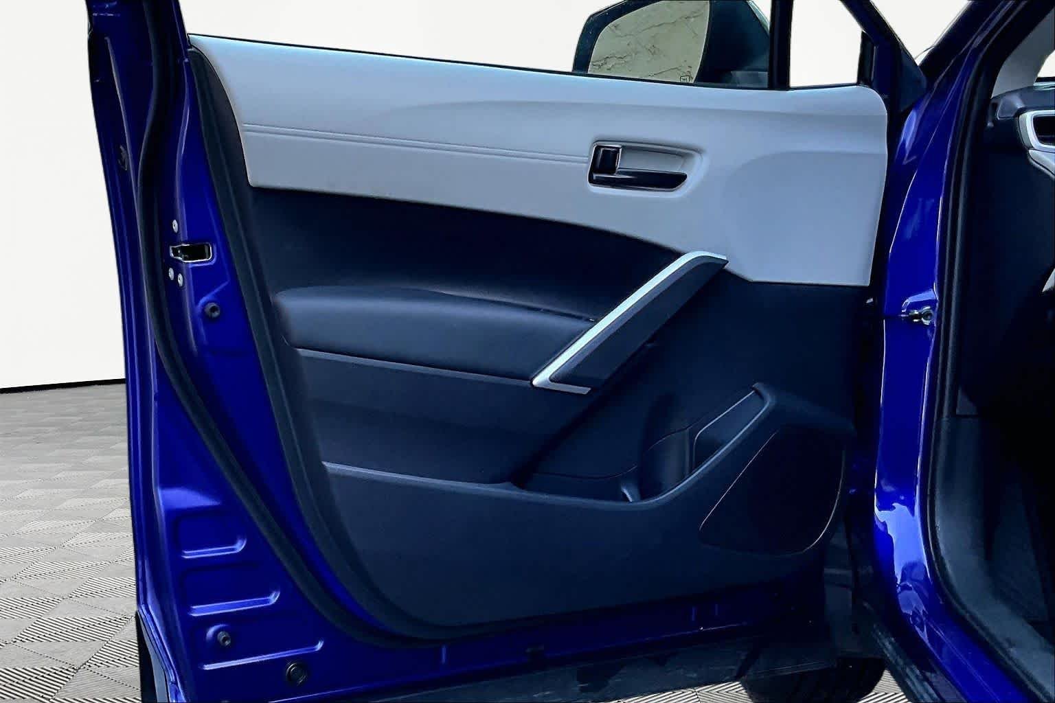 Used 2025 Blue Crush Metallic Toyota LE image 22