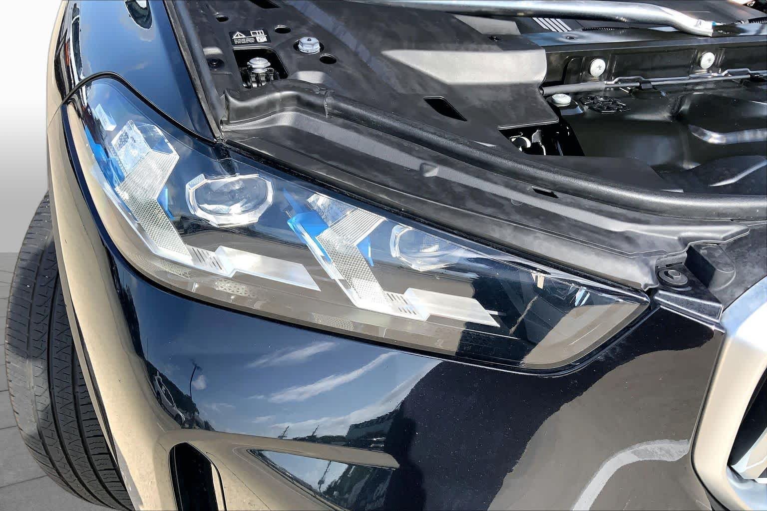 Used 2025 Black Sapphire Metallic BMW xDrive50e image 27
