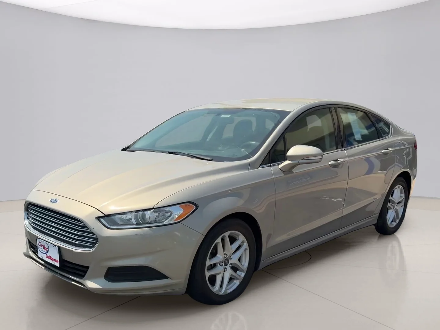 Used 2016 Gold Ford SE image 1