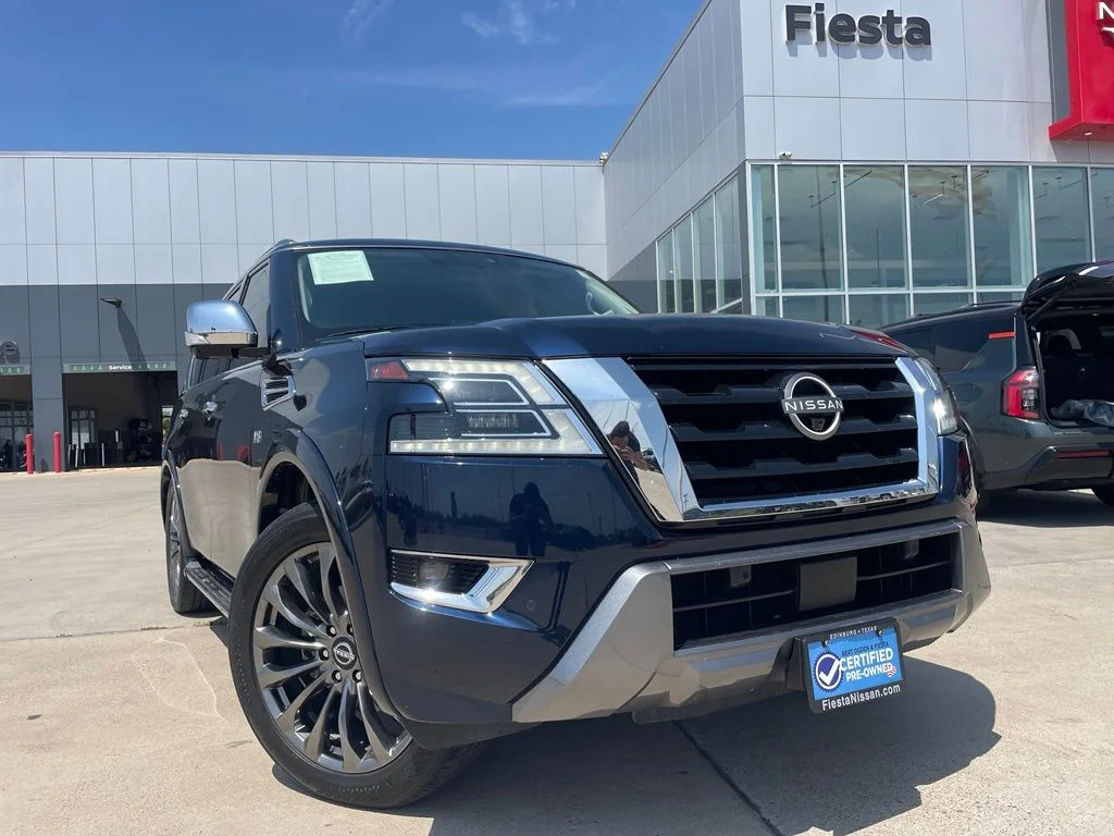 Used 2022 Blue Nissan Platinum image 1