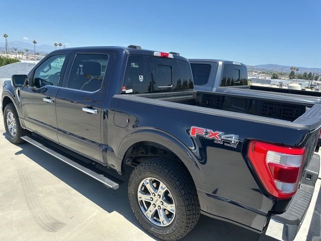 Certified Used 2021 Blue Metallic Ford Lariat image 2