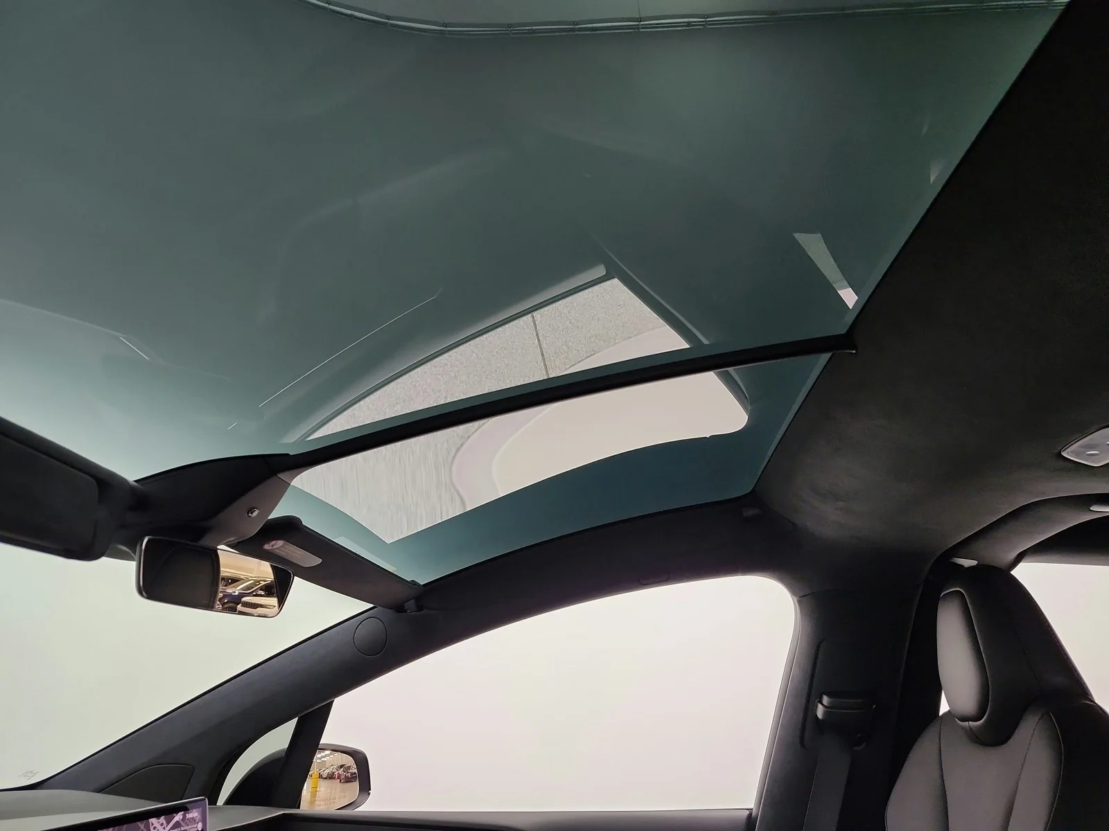 Used 2024 Solid Black Tesla AWD image 16