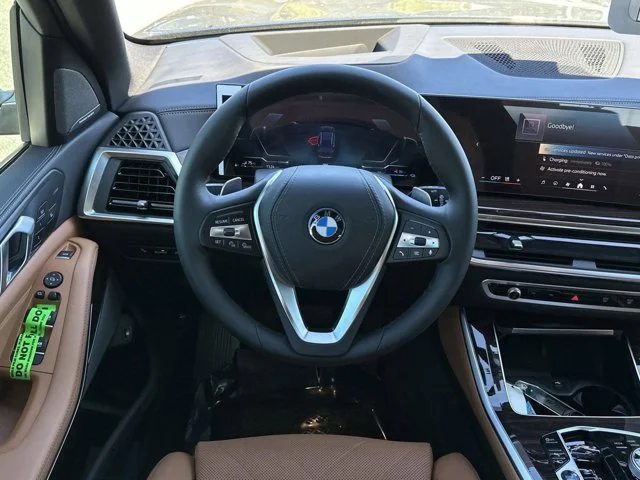 New 2026 Tanzanite Blue II Metallic BMW xDrive50e image 14