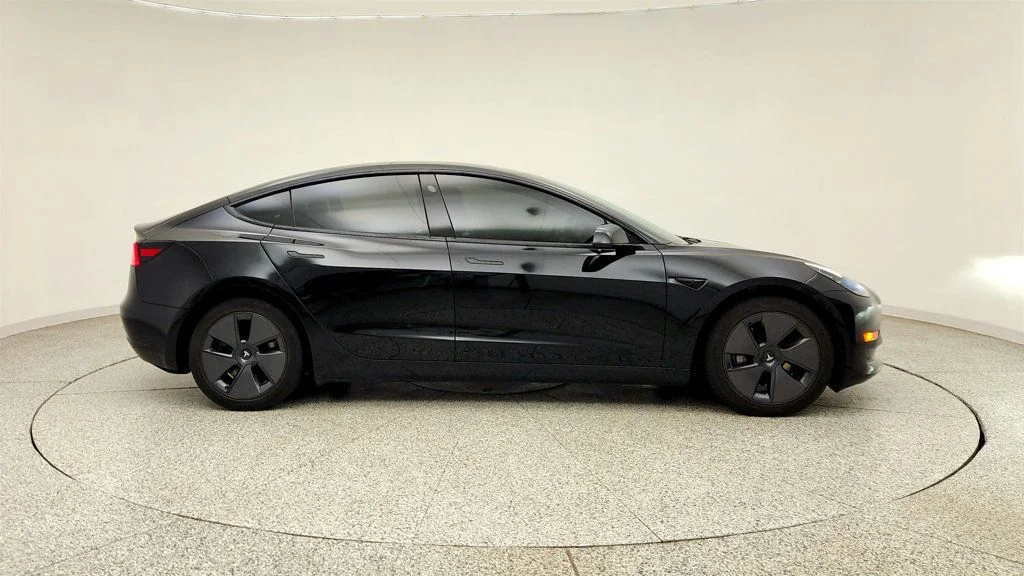 Used 2023 Solid Black Tesla RWD image 4