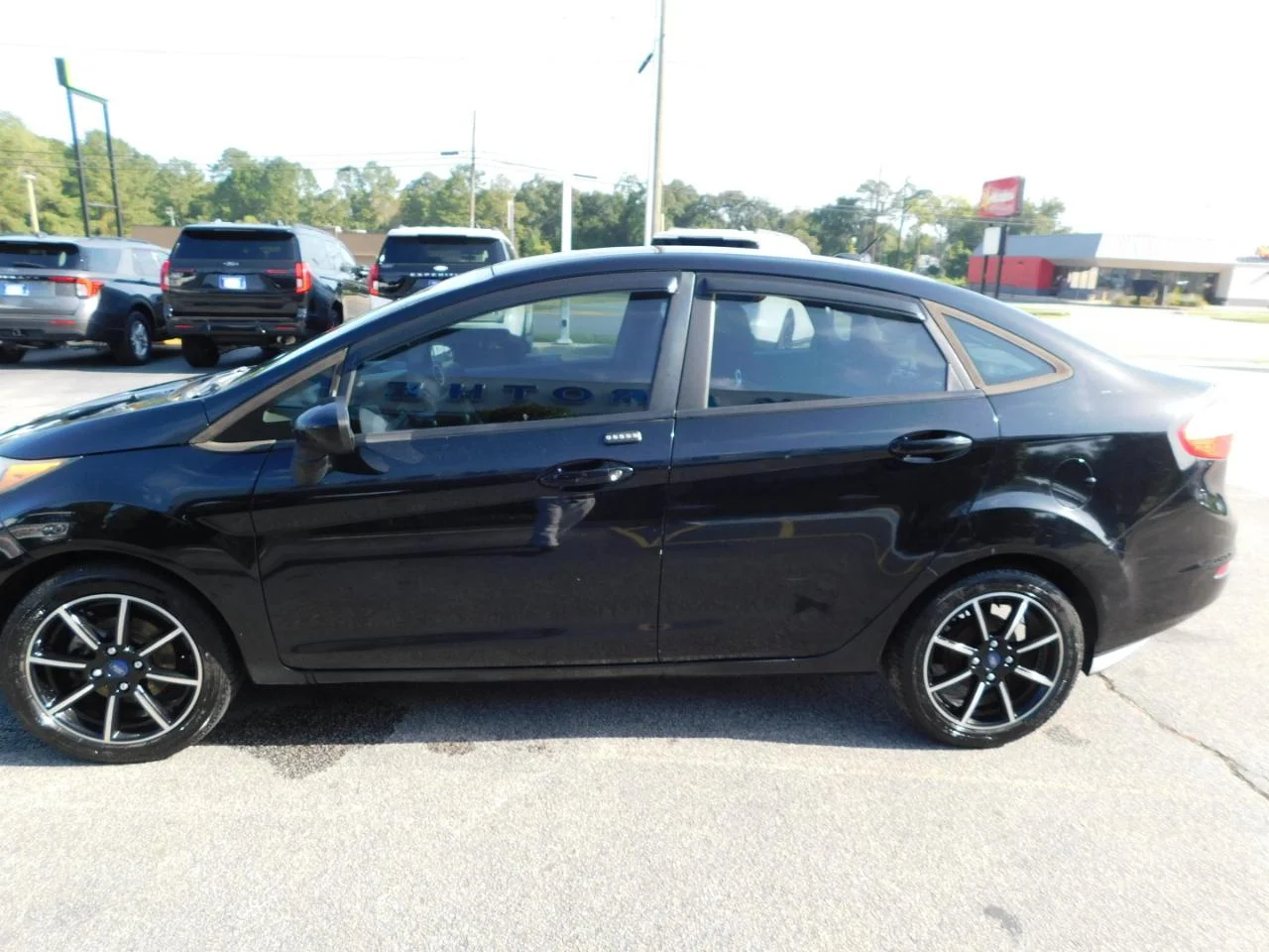 Used 2018 Black Ford SE SEDAN image 5