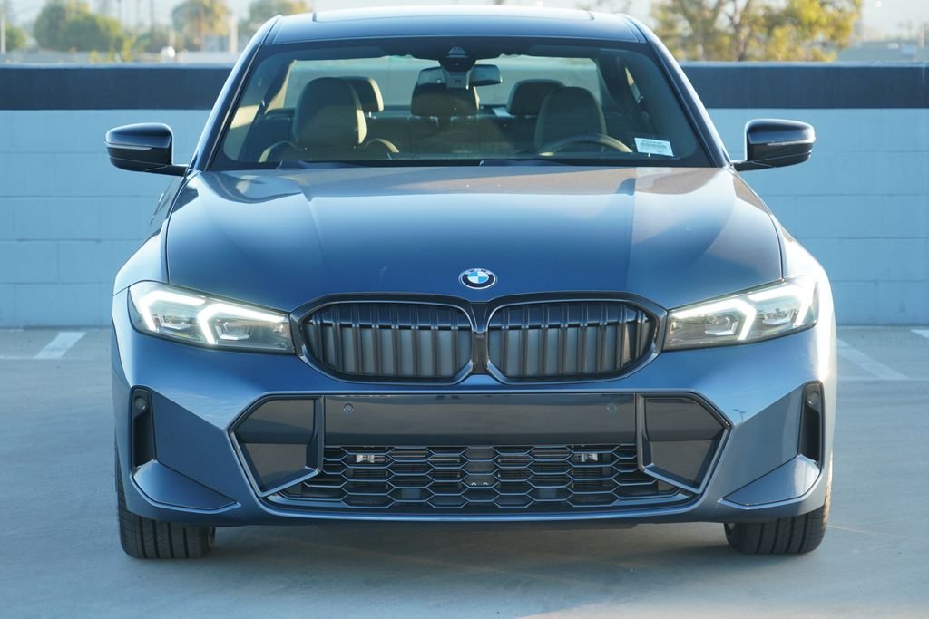 New 2026 Arctic Race Blue Metallic BMW 330i image 2