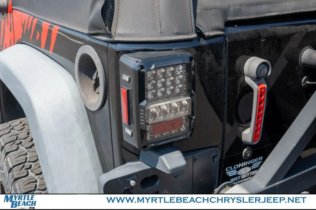 Used 2015 Black Clearcoat Jeep Unlimited Sport image 12