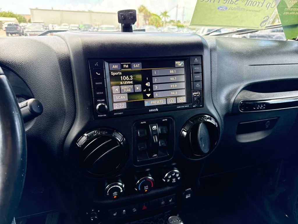 Used 2016 Black Jeep Unlimited Sahara image 16